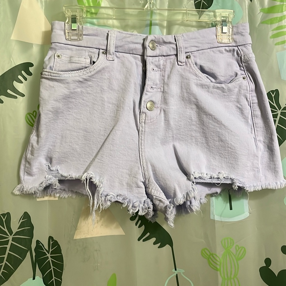 No Boundaries lavender distressed button fly denim shorts